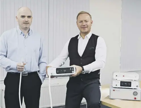  ?? ?? ↑ Emblation founders Eamon Mcerlean (left) and Gary Beale, who met during postgradua­te studies at Heriot-watt University