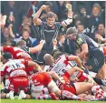  ??  ?? Rescue mission: Exeter celebrate after Damian Welch’s last-gasp try yesterday