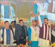  ?? HT PHOTO ?? ▪ Union transport minister Nitin Gadkari and dy CM Keshav Maurya waving to the crowd from a stage in Deoria on Thursday.
