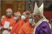  ?? GREGORIO BORGIA — THE ASSOCIATED PRESS FILE ?? Pope Francis arrives to celebrate Mass at St. Peter’s Basilica.