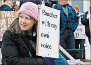  ?? MOLLY YOUNG/THE OREGONIAN ?? Jennifer Williams, who owns a small ranch, voices her opposition to standoff supporters Monday in Burns, Ore. Four holdouts refuse to surrender at the national wildlife refuge.