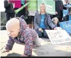  ??  ?? A rally outside the Scottish Parliament in support of the ban on smacking