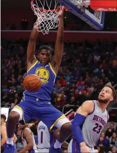  ?? GREGORY SHAMUS — GETTY IMAGES ?? The Warriors’ Kevon Looney, a forward in his fourth year, dunks on Saturday. Looney could see increased time at center after starter Damian Jones’ injury.