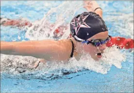  ?? Scott Herpst ?? Heritage Middle School’s Lisa Afonshina drives toward the wall during the butterfly portion of the girls’ 200-yard medley relay at the Baylor School this past Wednesday.