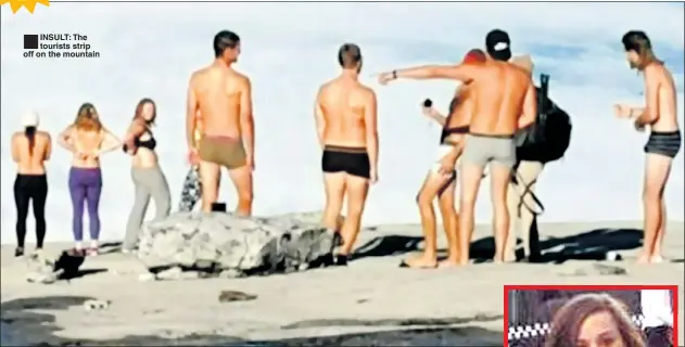  ??  ?? INSULT: The tourists strip off on the mountain