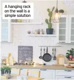  ??  ?? A hanging rack on the wall is a simple solution