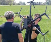  ?? BILL LACKEY/ STAFF ?? Gus Meyer, a drone pilot at SIC Drones, calibrates one of the company’s UAV’s at the Springfiel­d Beckley Municipal Airport Thursday.