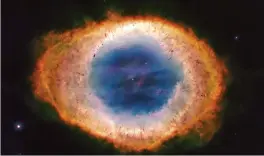  ??  ?? This image shows the Ring Nebula, M57. This could be a self-portrait of our Sun in about 5-billion years’ time! Our Sun will eventually swell up to become a red giant star, throw off its outer layers and leave behind a small, dense white dwarf star at...