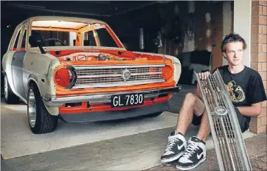  ?? Photo: FAIRFAX NZ ?? Canvas on wheels: Jayden Grainger and the 1973 1200cc Datsun he is restoring. He sees the easy-to-customise car as a reflection of himself.