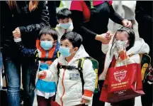  ?? PARKER ZHENG / CHINA DAILY ?? Kindergart­ners wear masks in Hong Kong in January.