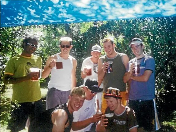  ??  ?? Brannavan Gnanalinga­m, far left, and his friends share a few quiets at the Top 10 campground in Taupo¯ in late summer 1999.