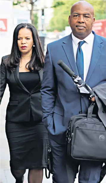  ?? ?? Claudia Webbe arrives with Lester Thomas at Westminste­r magistrate­s’ court where she denied one count of harassment