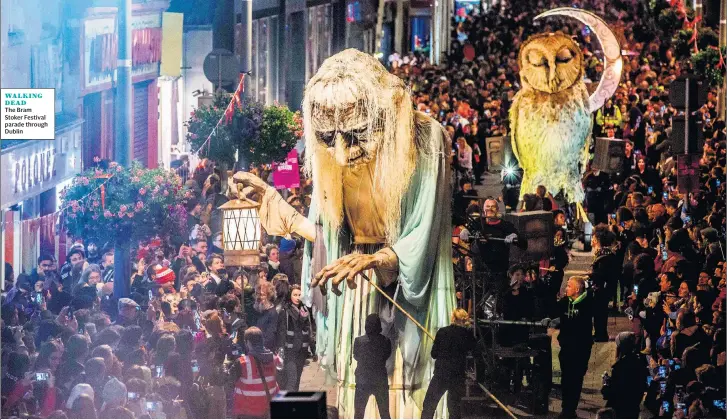  ??  ?? WALKING DEADThe Bram Stoker Festival parade through Dublin