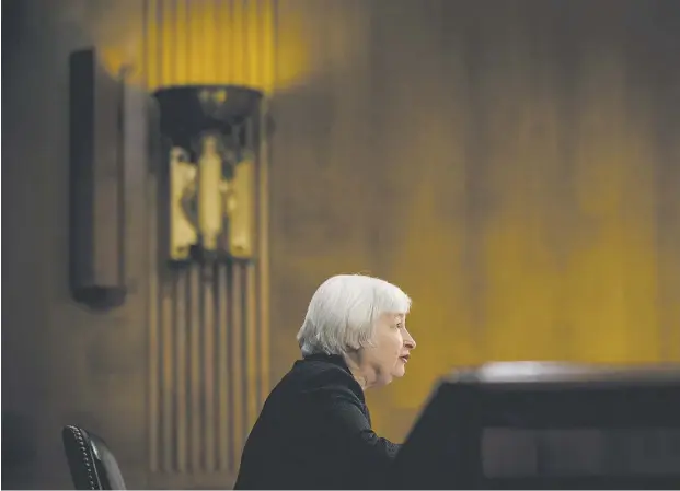  ?? Pete Marovich / Bloomberg news ?? Janet Yellen, U.S. president Barack Obama’s nominee as chair of the Federal Reserve, testifies before the Senate banking committee confirmati­on
hearing in Washington on Thursday, and signals she will carry on the bank’s stimulus until she sees...