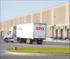  ?? Hearst Connecticu­t Media file photo ?? An XPO Logistics truck in November outside the Long Beach Boulevard warehouses in Stratford, leased by Amazon for a new distributi­on center.