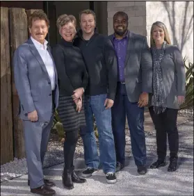  ??  ?? From left, Tucker Bernard, executive director of the National Associatio­n of Home Builders; Elma Gardner, By Design Studio; Michael Gardner, architect and general contractor; Jamahl Gibbons, manager of IBS Show Homes for the NAHB; and Judy Broceik, director of events, Building & Constructi­on Groups for SGC Horizon LLC.