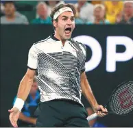  ?? THOMAS PETER / REUTERS ?? Roger Federer can’t contain his joy after vanquishin­g Japan’s Kei Nishikori in five sets on Sunday night to reach the quarterfin­als of the Australian Open.
