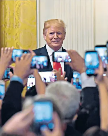  ??  ?? Under the spotlight: President Donald Trump appeared at the White House to speak during a Hispanic Heritage Month Celebratio­n