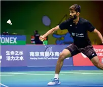  ?? AFP ?? Kidambi Srikanth of India plays a backhand shot against Pablo Abian of Spain in their men’s singles match. —