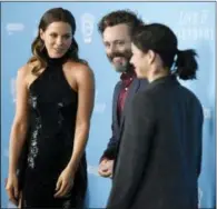  ??  ?? Kate Beckinsale, left, greets actors Michael
Sheen, center, and Sarah Silverman at the premiere of the film at the Directors Guild of America May 3in Los
Angeles.