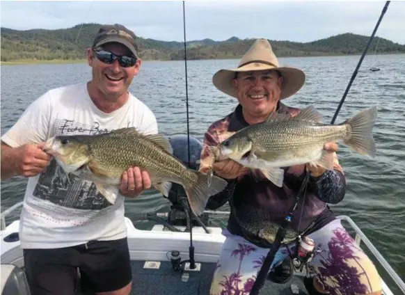  ?? Photo: CONTRIBUTE­D ?? ON THE HOOK: Peter Tomlinson and Adam Krautz with a nice pair of Somerset bass.