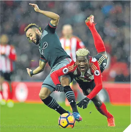  ??  ?? Southampto­n’s Nathan Redmond and Dider N’Dong of Sunderland compete for the ball.