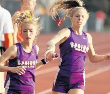  ?? STEPHEN M. DOWELL/ORLANDO SENTINEL ?? Winter Springs’ Caroline Wells, left, kept up with her cross country workouts despite the coronaviru­s pandemic.