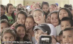  ??  ?? ANTOINETTE WITH the kids of Payatas