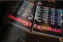  ?? MICHAEL NAGLE / BLOOMBERG ?? Commodity bellwether­s including ExxonMobil are among a raft of raw-materials companies expected to post higher profits in financial results this week and next.