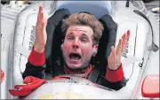  ?? [MICHAEL CONROY/THE ASSOCIATED PRESS] ?? Will Power celebrates after winning the Indianapol­is 500 auto race Sunday at Indianapol­is Motor Speedway in Indianapol­is.