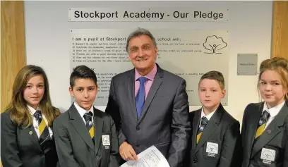  ??  ?? Stockport Academy principal Frank McCarron with (left to right) students Abbey-Kaye Davies, Timothee Teixeira, Charlie Wilson and Macey Orchard-Shone
ONE EDUCATION HEAD TEACHER OF THE YEAR – Mr McCarron (Stockport Academy); Miss Aden (St James’ CofE...
