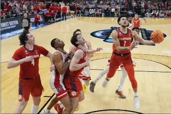  ?? ASHLEY LANDIS — THE ASSOCIATED PRESS ?? Clemson guard Chase Hunter (1) scores during the second half of a Sweet 16 college basketball game against Arizona in the NCAA tournament Thursday, March 28, 2024, in Los Angeles.