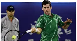  ?? REX ?? Action: Djokovic playing at the Dubai Tennis Championsh­ips