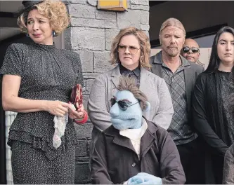  ?? HOPPER STONE THE ASSOCIATED PRESS ?? Maya Rudolph, left, and Melissa McCarthy do their best to bring “The Happytime Murders" to life.