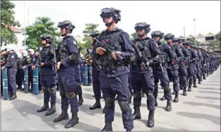  ?? CAM POST ?? Military police stand in formation to listen to speeches from their leaders in Phnom Penh on Wednesday. On Monday, Deputy Commander Vong Pisen told forces to be on high alert.