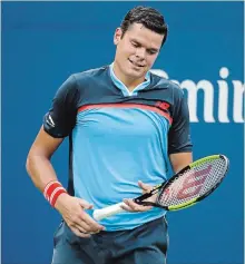  ?? JASON DECROW THE ASSOCIATED PRESS ?? Milos Raonic reacts after losing a point to John Isner on Sunday during the U.S. Open in New York. Raonic lost, 6-3, 3-6, 4-6, 6-3, 2-6.