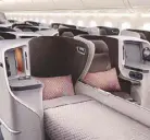  ??  ?? Business Class seats become full flat beds in Singapore Airlines’ new Boeing 787-10 Dreamliner.