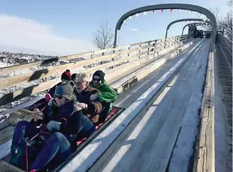  ??  ?? The Toboggan Slide Au 1884 takes you on a thrilling ride along the St. Lawrence River at speeds up to 45 mph.