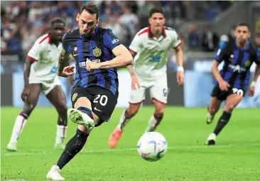  ?? reuters ?? Sharpshoot­er: inter Milan’s Hakan Calhanoglu scoring against Cagliari during the serie a match at the san siro. —