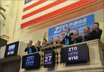  ?? HONG XIAO / CHINA DAILY ?? Chinese express delivery services provider ZTO Express Inc (NYSE: ZTO) makes its trading debut on Thursday at the New York Stock Exchange.