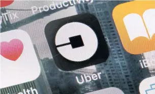 ?? RICHARD DREW/THE ASSOCIATED PRESS FILE PHOTO ?? Some privacy experts warn the Uber technology could discrimina­te against certain passengers.