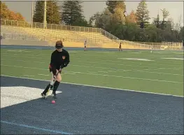  ?? JUSTIN COUCHOT — ENTERPRISE-RECORD ?? Chico High field hockey captain Kyla Smith, a senior, warms up before the Panthers’ match with Pleasant Valley on Wednesday.