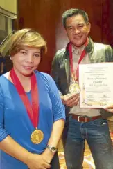  ??  ?? Susan Enriquez with Cesar Apolinario