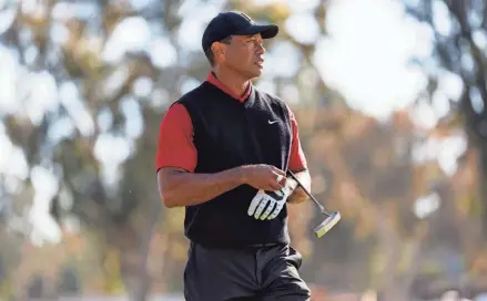  ?? RYAN KANG/AP ?? Tiger Woods walks to the green on the third hole during the final round of the Genesis Invitation­al golf tournament on Feb. 19 in the Pacific Palisades area of Los Angeles.