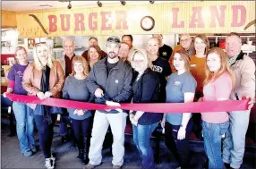  ?? LYNN KUTTER ENTERPRISE-LEADER ?? Lincoln Area Chamber of Commerce recently held a ribbon cutting ceremony for Burger Land and its new owners, Gary and Amy Ezell, center. The couple purchased the restaurant on Jan. 3.