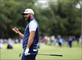  ?? PETER MORRISON — THE ASSOCIATED PRESS ?? U.S golfer Dustin Johnson after playing his second shot on the 4th hole during the JP McManus Pro-Am at Adare Manor, in Limerick, Ireland on Monday.