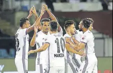  ?? ISL ?? Pune players celebrate their equaliser against Bengaluru.