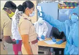  ??  ?? BMC health workers screen police personnel at Shivaji Nagar in Mankhurd on Tuesday.