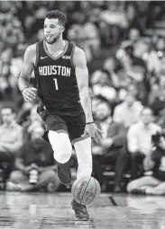  ?? Elizabeth Conley / Staff photograph­er ?? Michael Carter-Williams can count on more playing time while the Rockets are short on manpower.