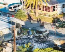  ?? DIRK SHADD/TAMPA BAY TIMES ?? An aerial drone view of the scene where a small plane crashed into the Bayside Waters mobile home park in Clearwater on Feb 1.